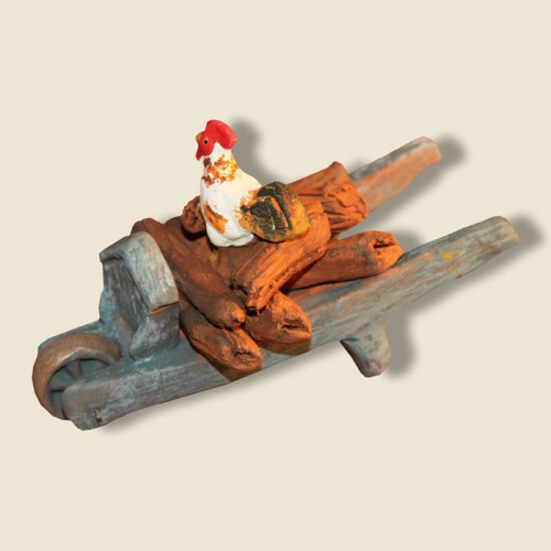 image: Brouette garçon avec bûche de bois et coq