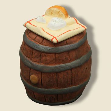 image: Cloth with bread and goat cheese on his Barrel