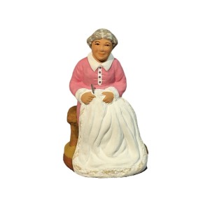 Seated embroideress