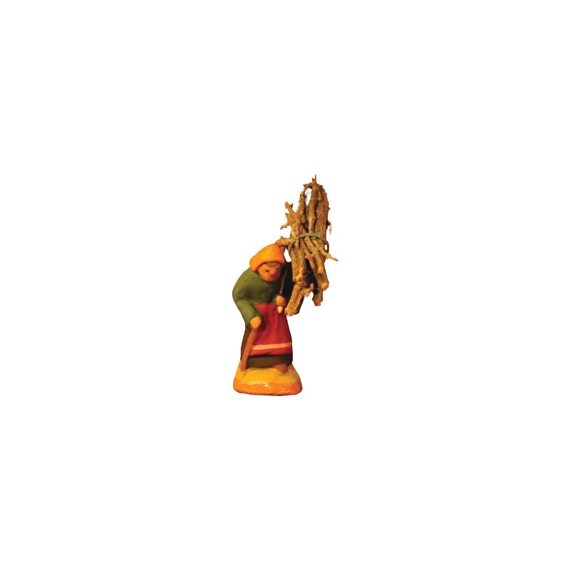 image: Woman carrying wood