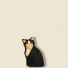 image: Chat noir assis